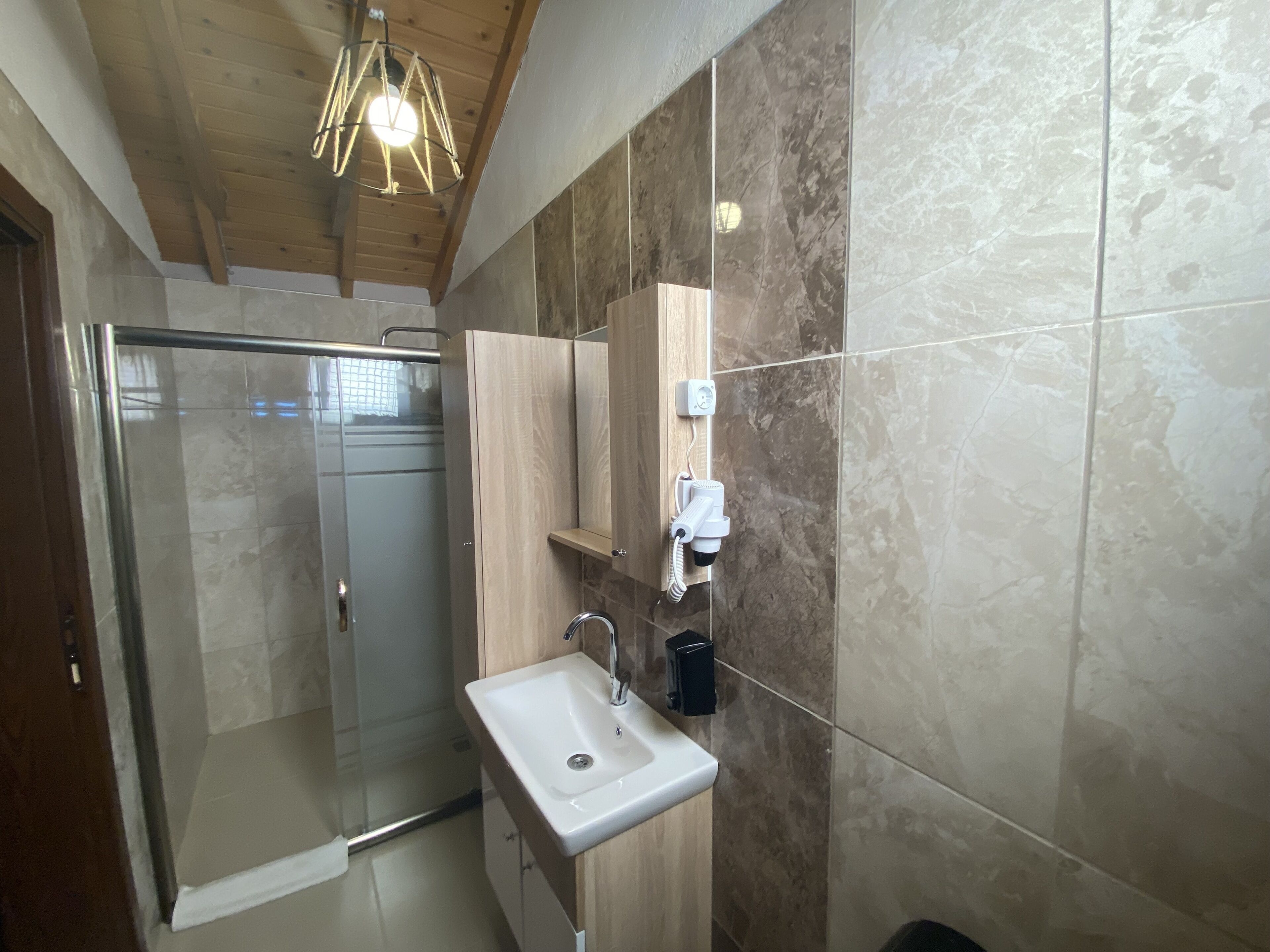 family twin room | bathroom | shower, free toiletries, hair dryer, slippers