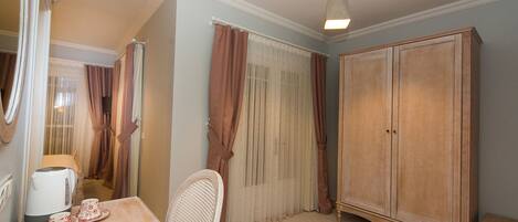 Suite, Garden Area | Free minibar items, in-room safe, desk, soundproofing