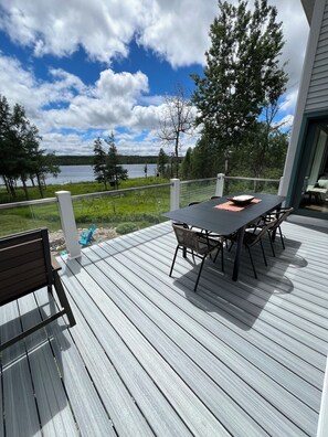 Outdoor dining - Lakefront home Clam Lake. Private dock for guests. Close to Torch Lk (Bellaire)