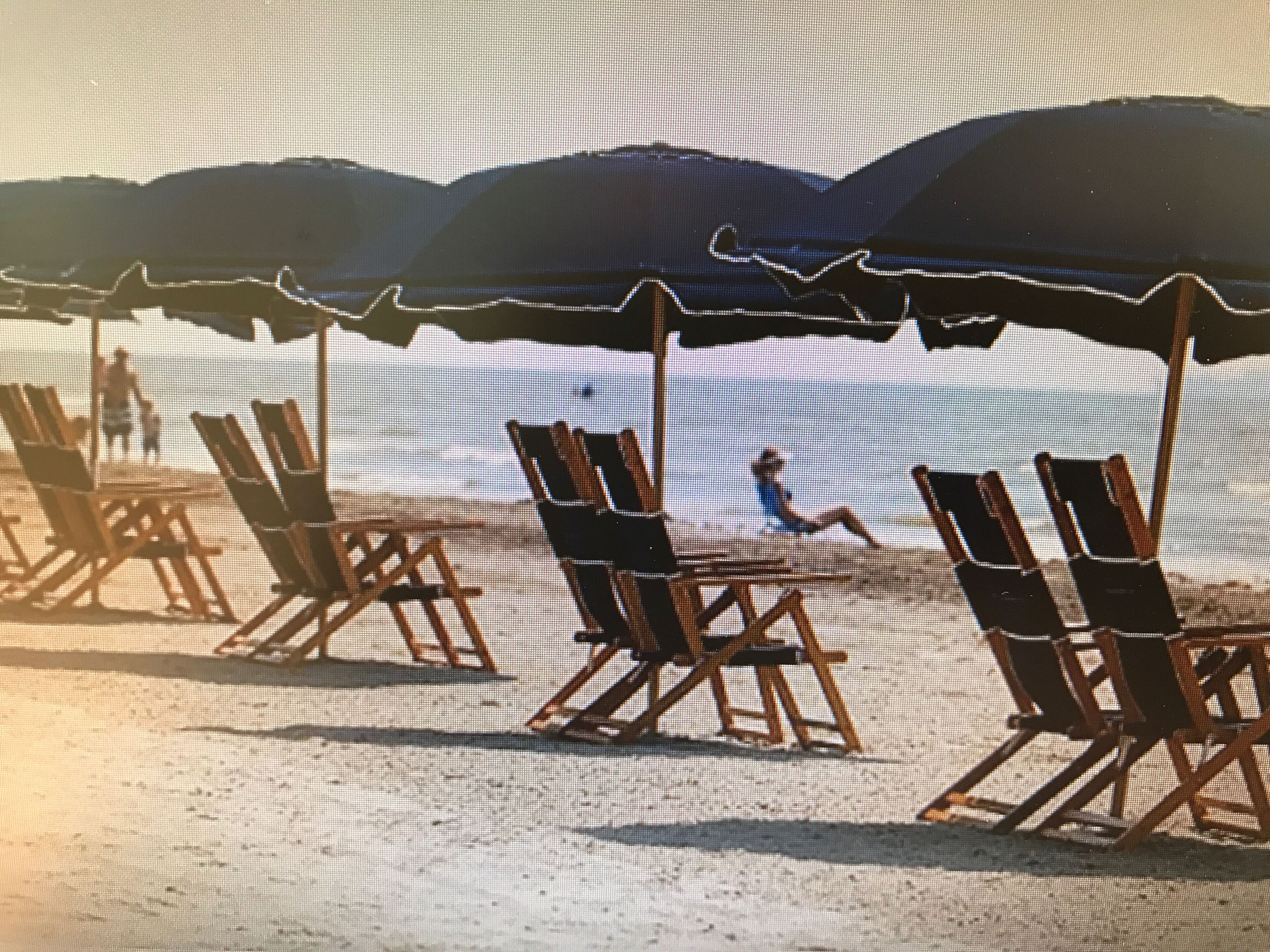 On the beach, sun loungers, beach towels