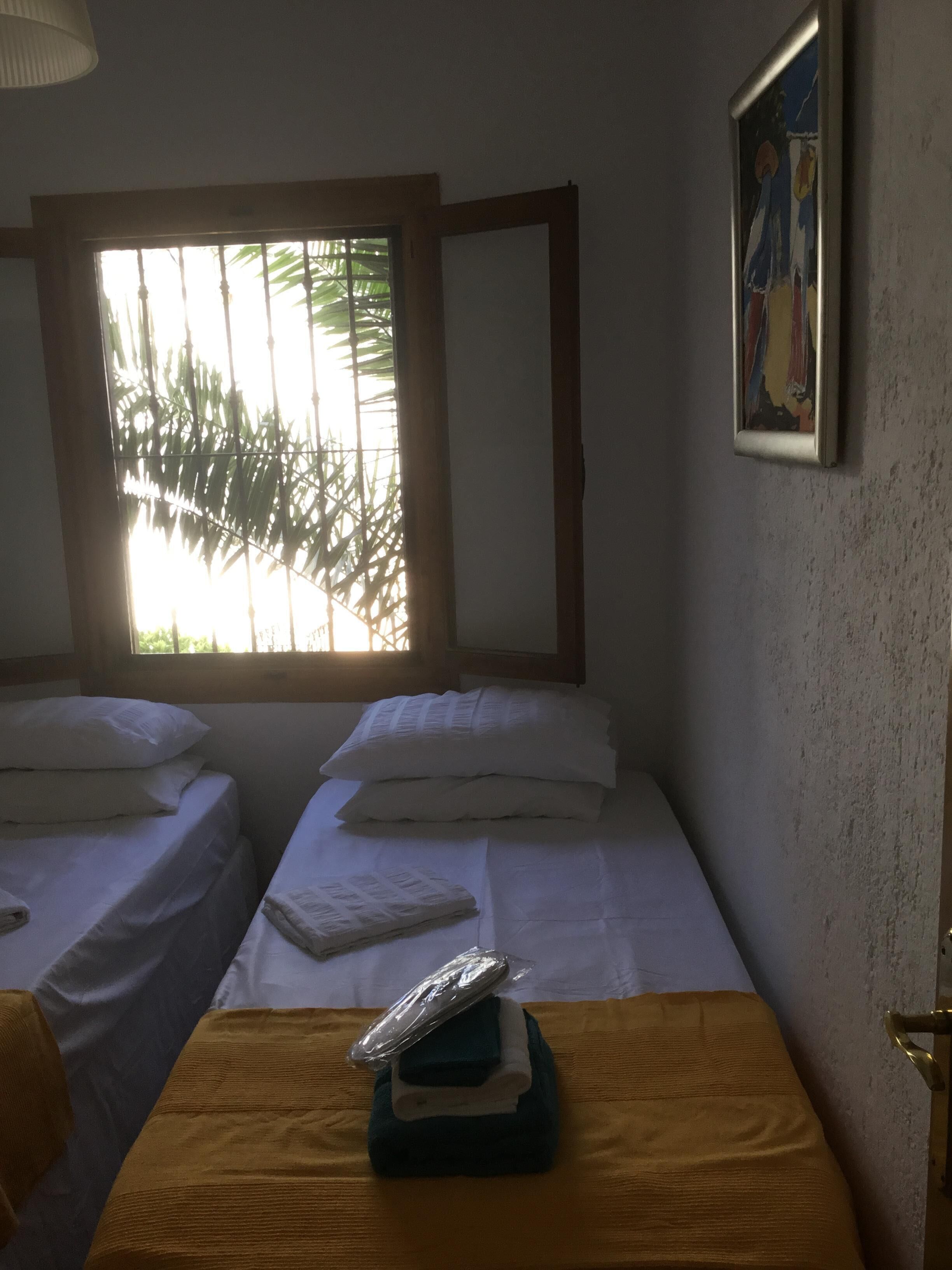2 dormitorios, tabla de planchar con plancha, wifi y ropa de cama