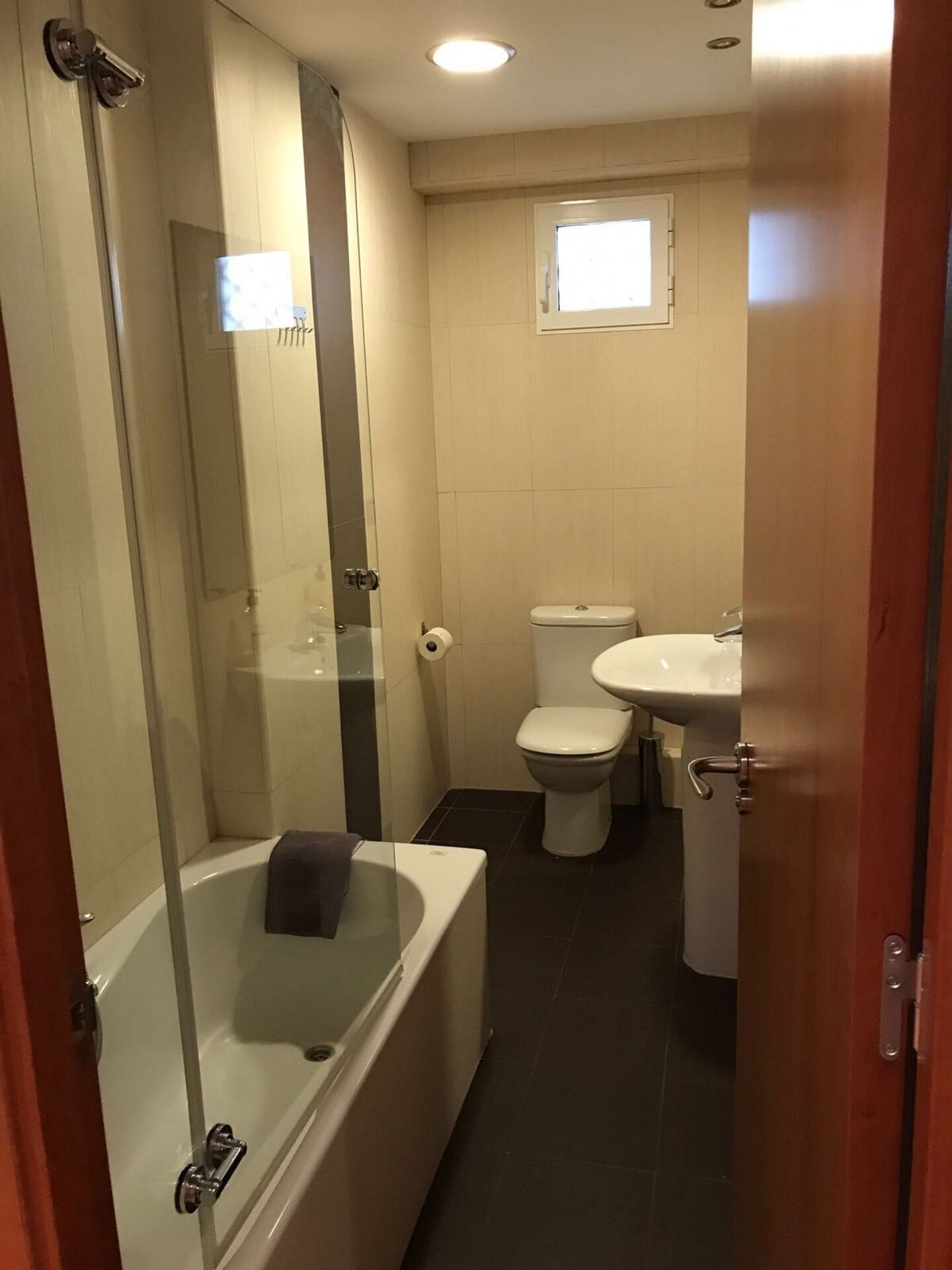 Combined shower/tub, hair dryer, towels, soap