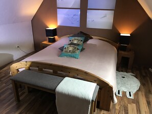 1 bedroom, desk, iron/ironing board, travel crib