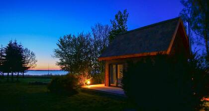 Vacation home for up to 12 people on the Baltic Sea / Bodden with rowing boat and sauna