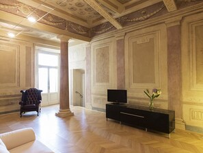 Apartment, 1 Bedroom | Living area | Flat-screen TV, fireplace, DVD player - Rent in Tuscany Cortona Deluxe (Cortona)