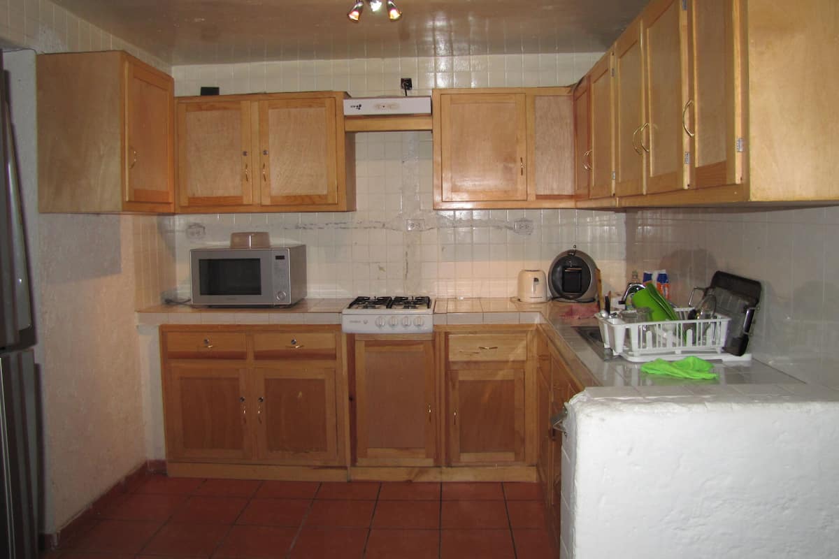 Fridge, microwave, cookware/dishes/utensils