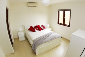 Apartment, 1 Bedroom, Pool Access, Partial Ocean View | 1 bedroom, iron/ironing board, free cots/infant beds, free WiFi - Green View at Blue Bay Curacao (Sint Michiel)