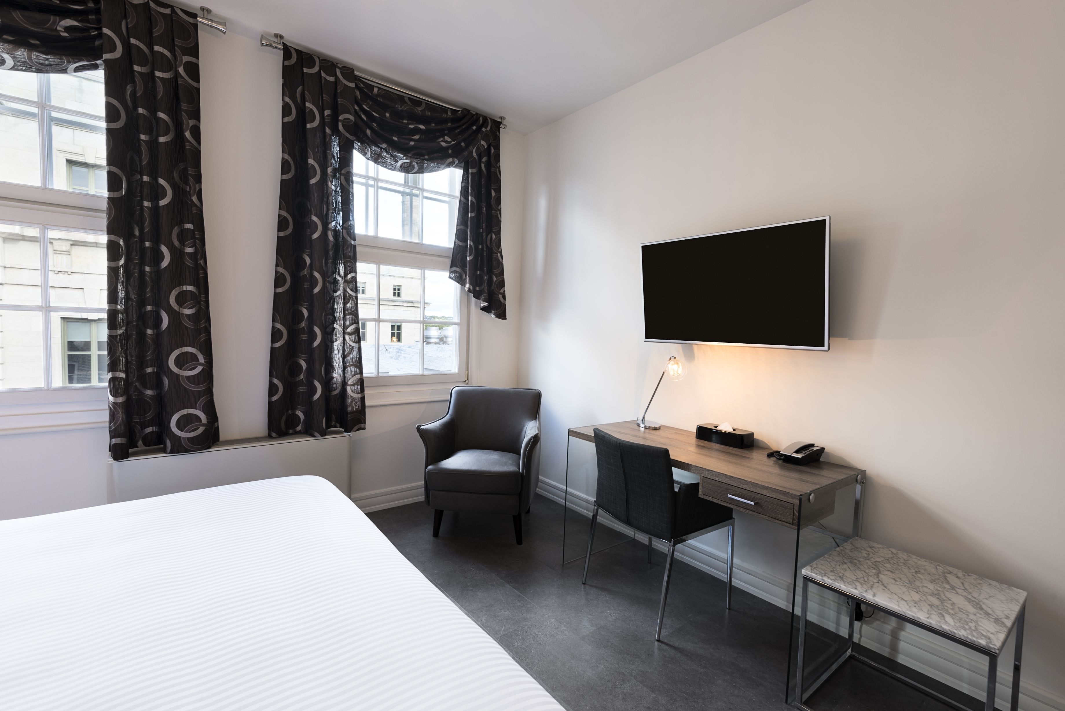 superior room, 1 queen bed | in-room safe, desk, soundproofing, iron/ironing board