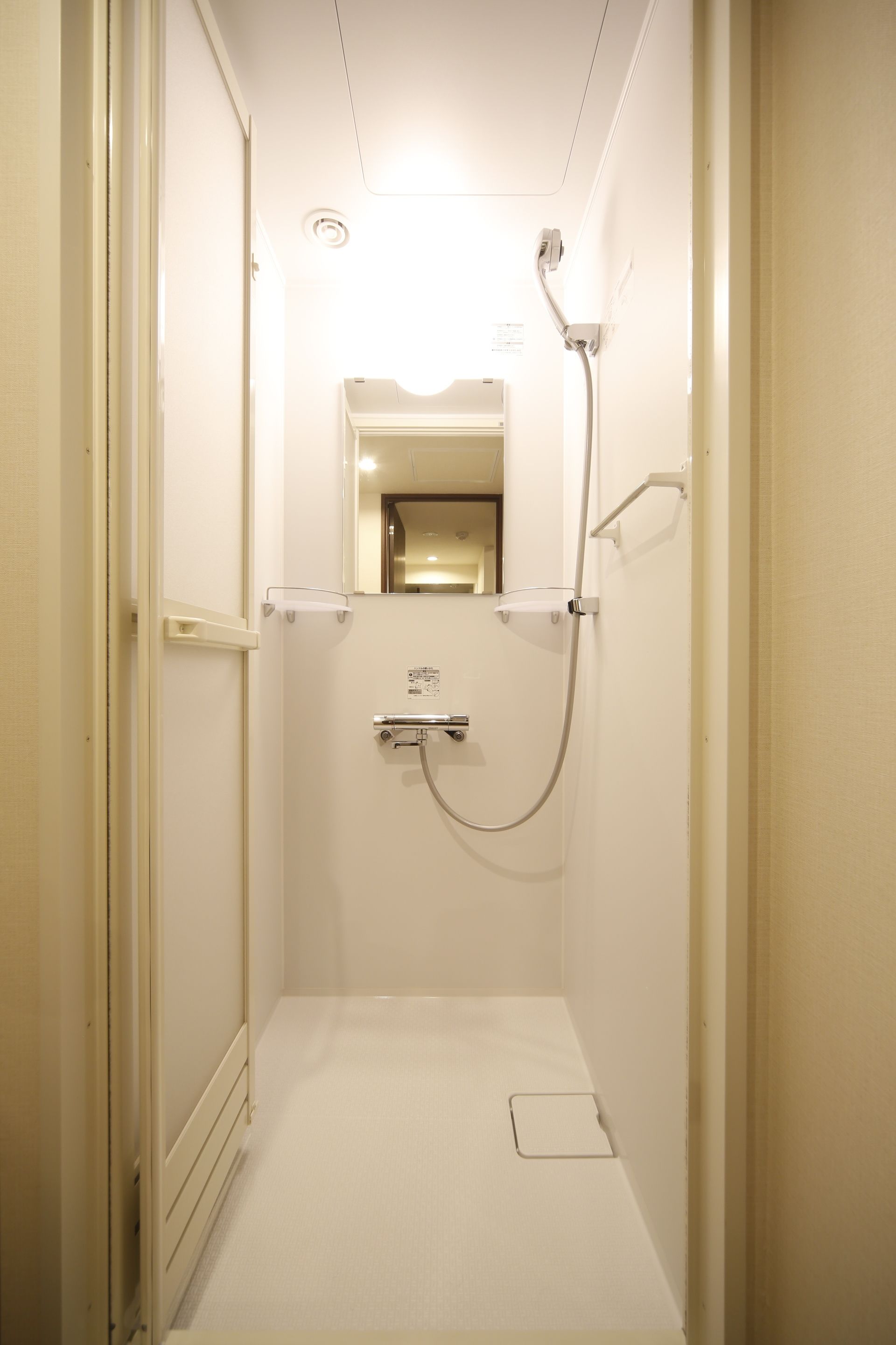 shower, hair dryer, slippers, electronic bidet