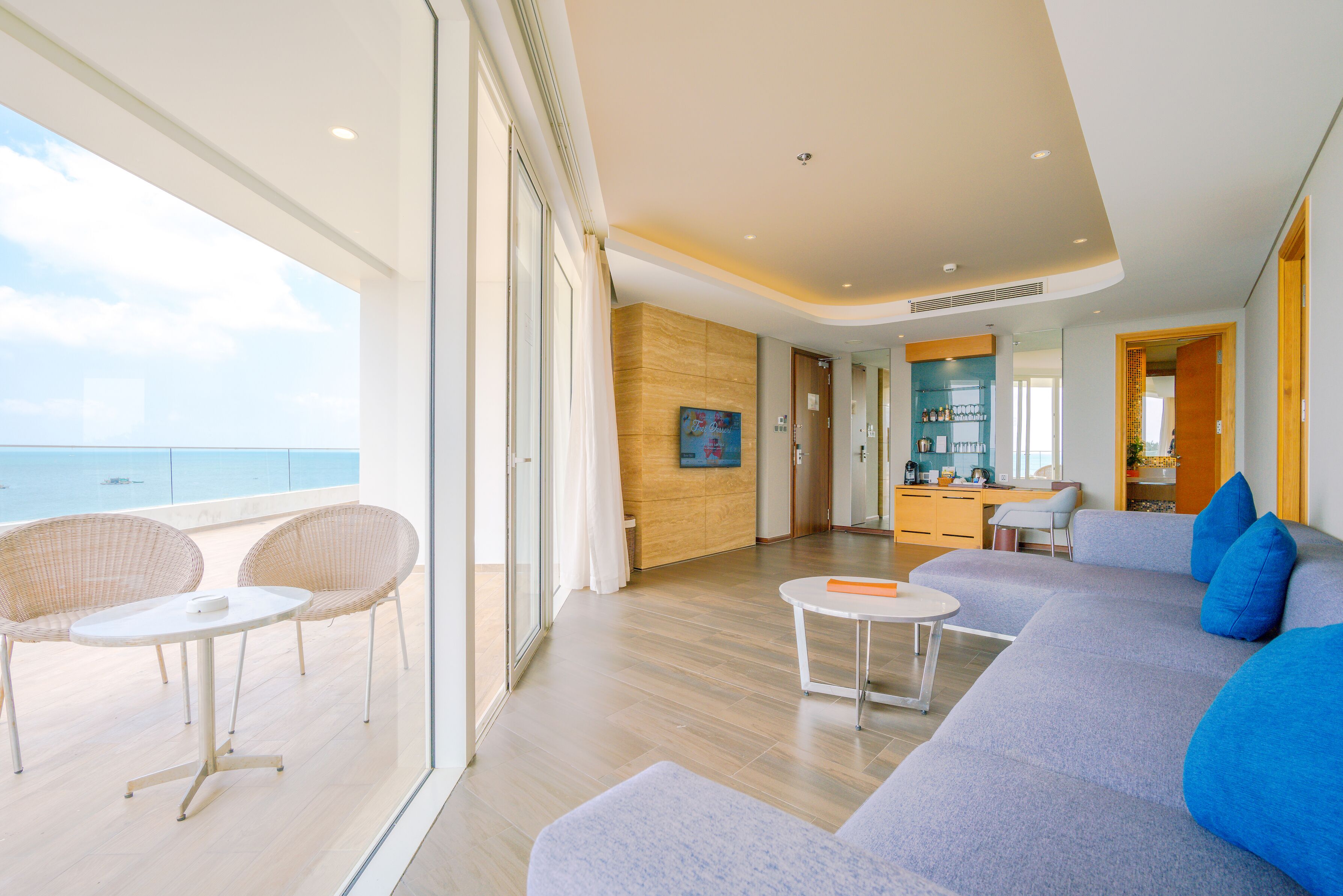 phu quoc suite 2 bedrooms (40-minute body massage for 4) | living room | 32-inch led tv with cable channels, tv