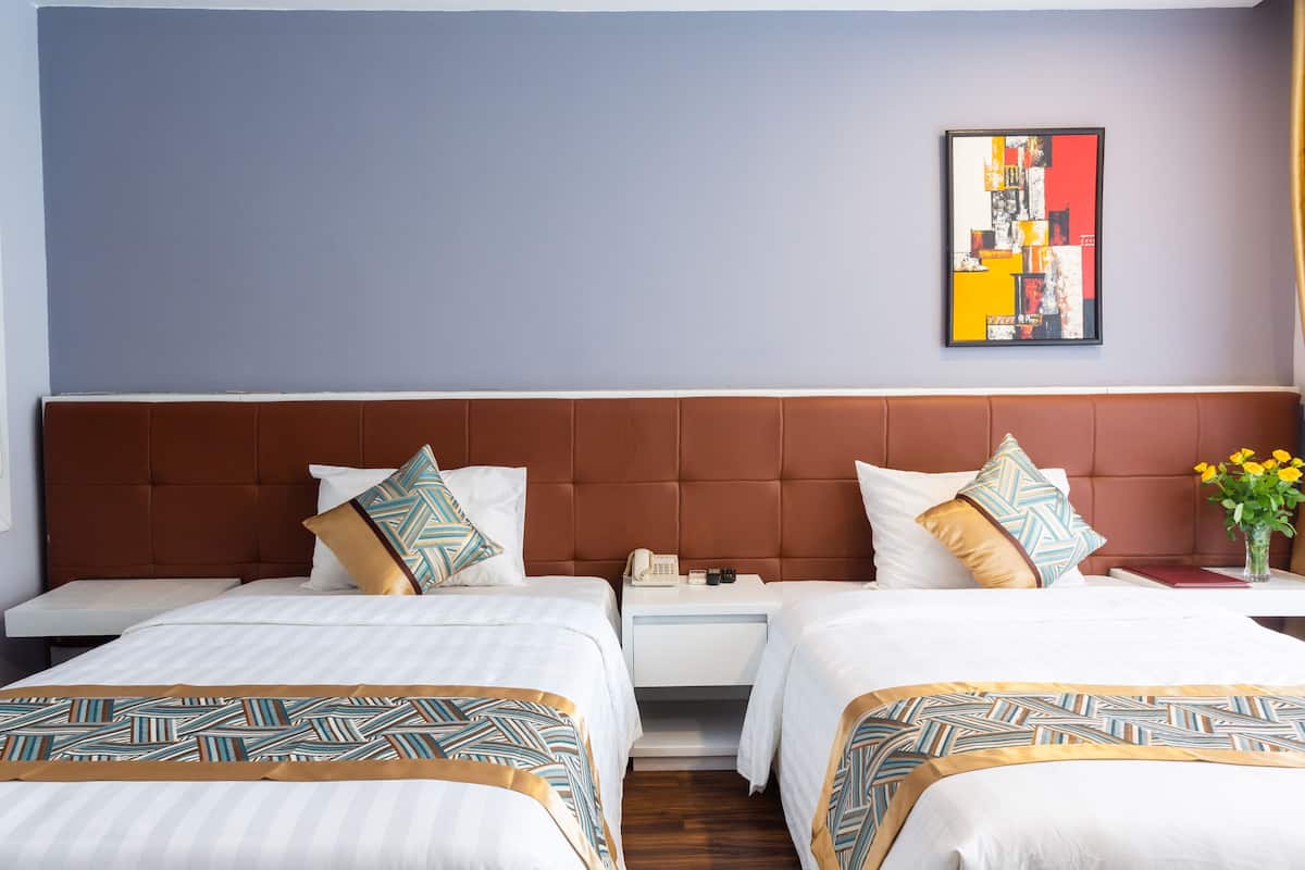 Superior Twin Room | Minibar, in-room safe, individually decorated, individually furnished