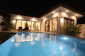 A modern house with a swimming pool, large sliding glass doors, and outdoor seating. - Seava House Ao-Nang Krabi (Krabi)
