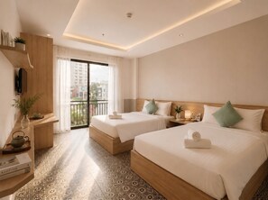 Quarto duplo luxo, 2 camas de casal, vista para a cidade | Vista do quarto