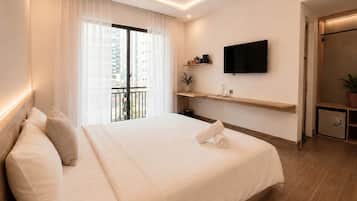 Deluxe tweepersoonskamer, 1 kingsize bed, uitzicht op de stad | Luxe beddengoed, pillowtop-bedden, een minibar, een bureau