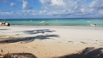 On the beach, white sand, snorkelling, motor boating