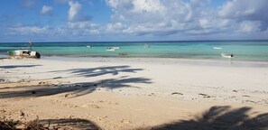 On the beach, white sand, snorkeling, motor boating