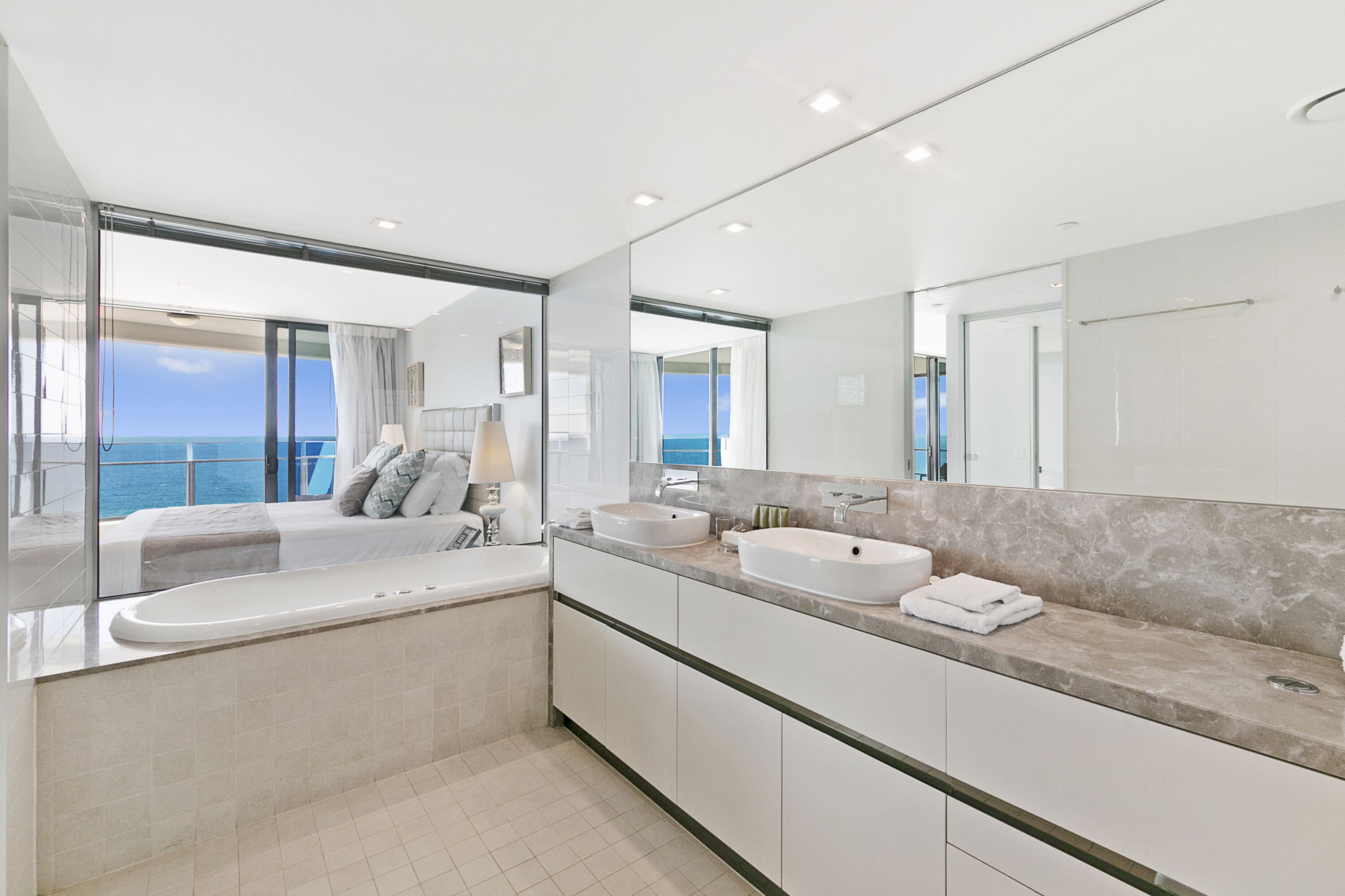 separate bathtub and shower, hair dryer, towels, soap