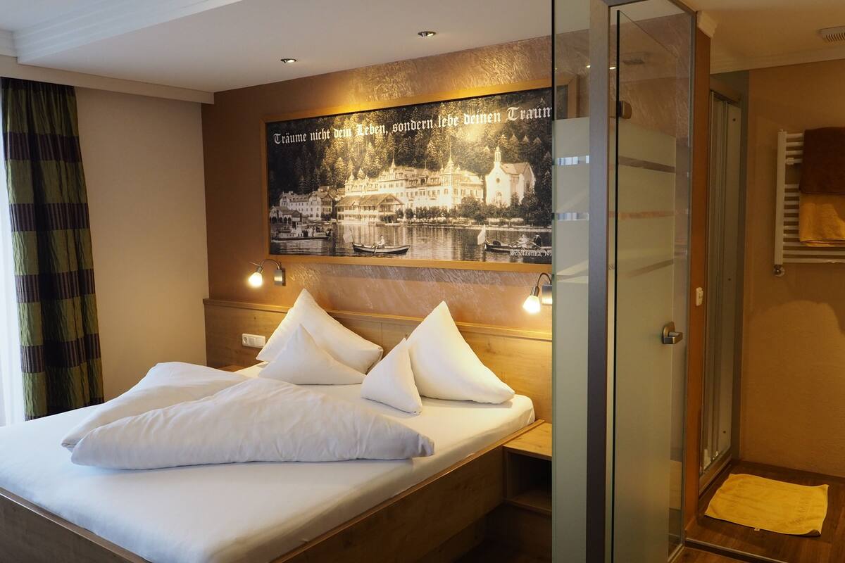 comfort double room (large) | bathroom | hair dryer, towels