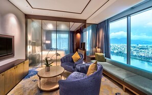 Presidential Suite, 2 Bedrooms | Living area | Flat-screen TV, fireplace, DVD player - Hilton Da Nang (Da Nang)