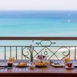 On the beach, sun-loungers, beach umbrellas, beach towels