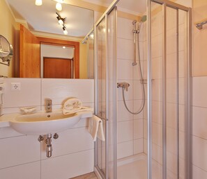 Apartment, 1 Bedroom, Balcony (Enzian) | Bathroom | Shower, free toiletries, hair dryer, towels