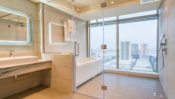 Deep-soaking bathtub, free toiletries, hair dryer, bathrobes