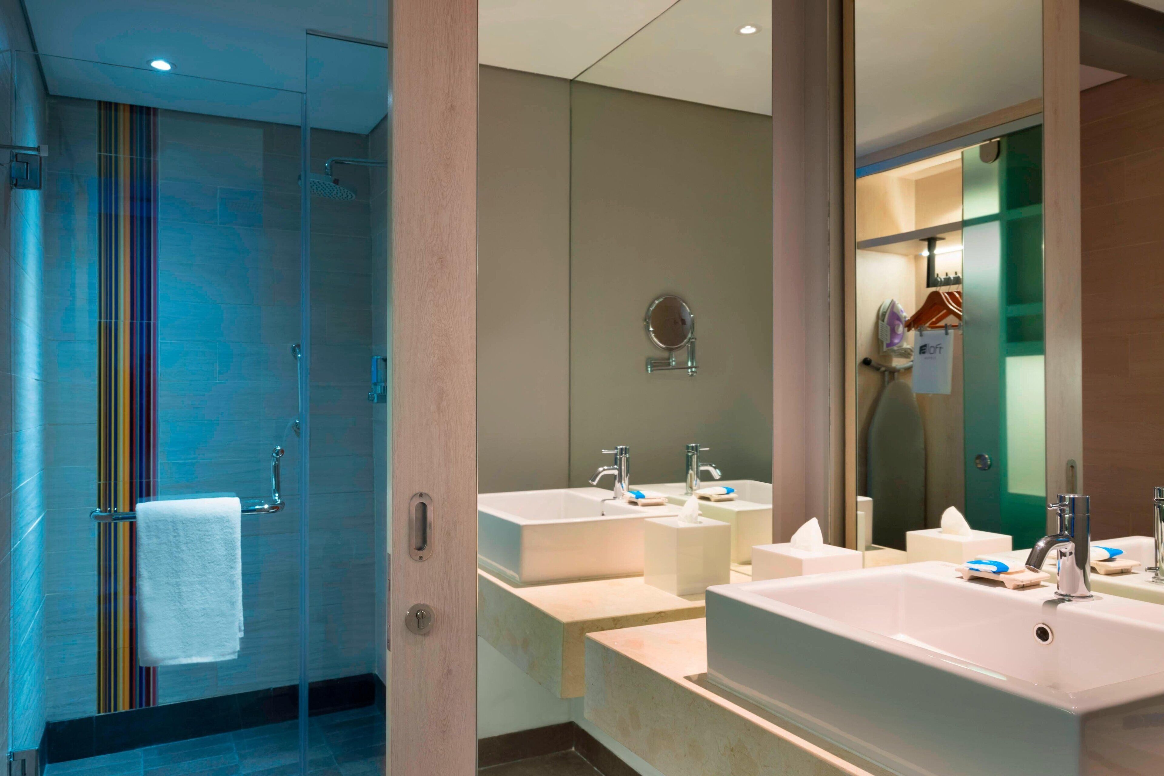 shower, rainfall showerhead, designer toiletries, hair dryer