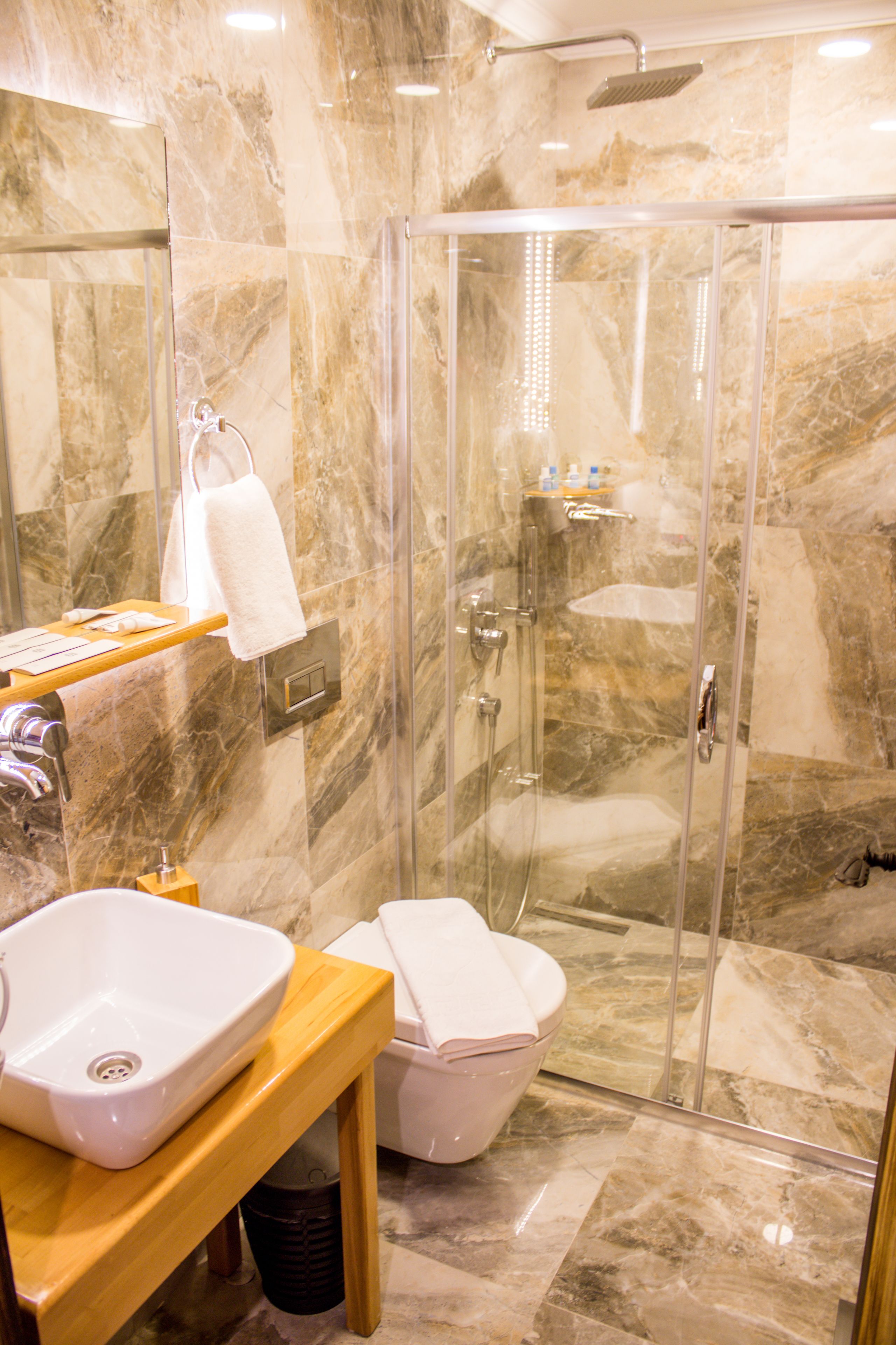 deluxe double room | bathroom | designer toiletries, hair dryer, slippers, towels