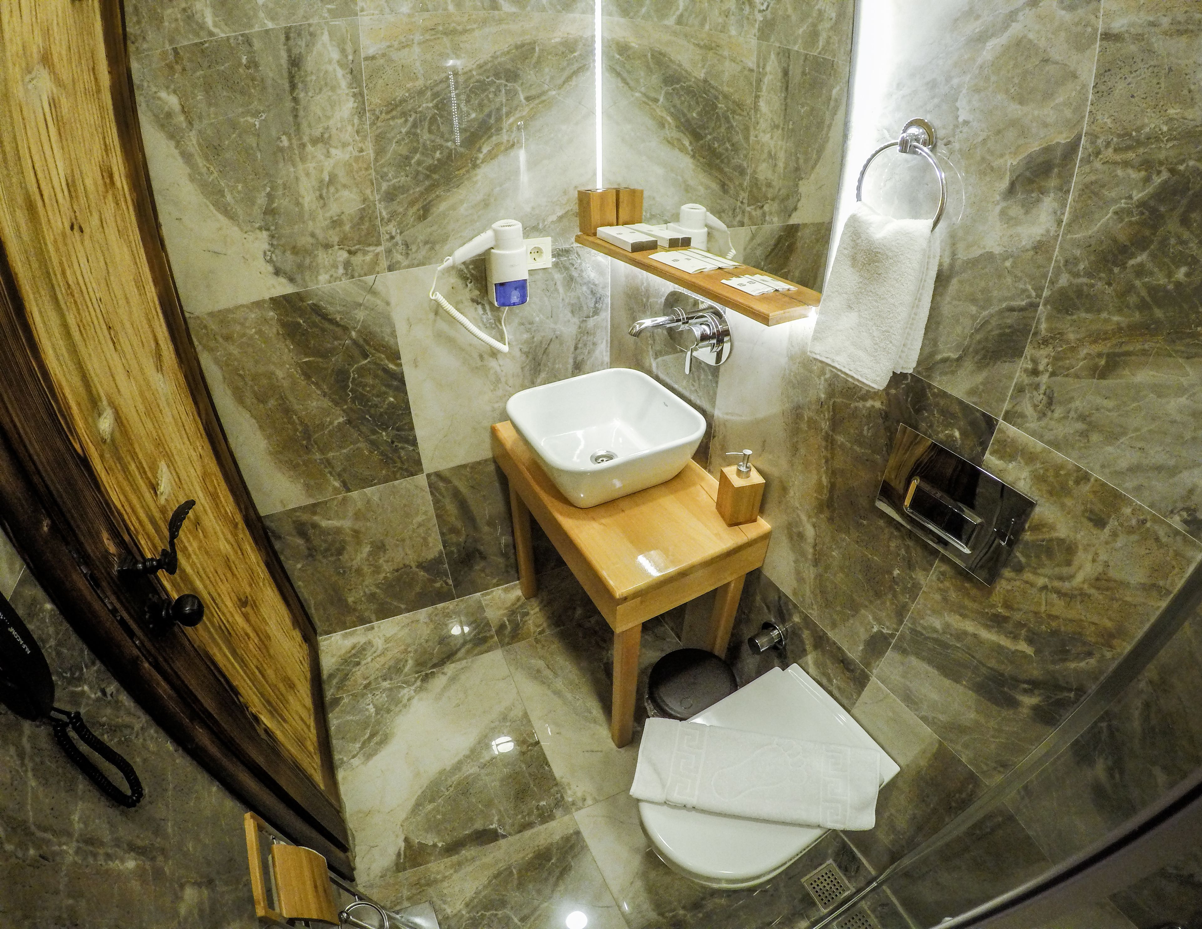 standard double room | bathroom | designer toiletries, hair dryer, slippers, towels