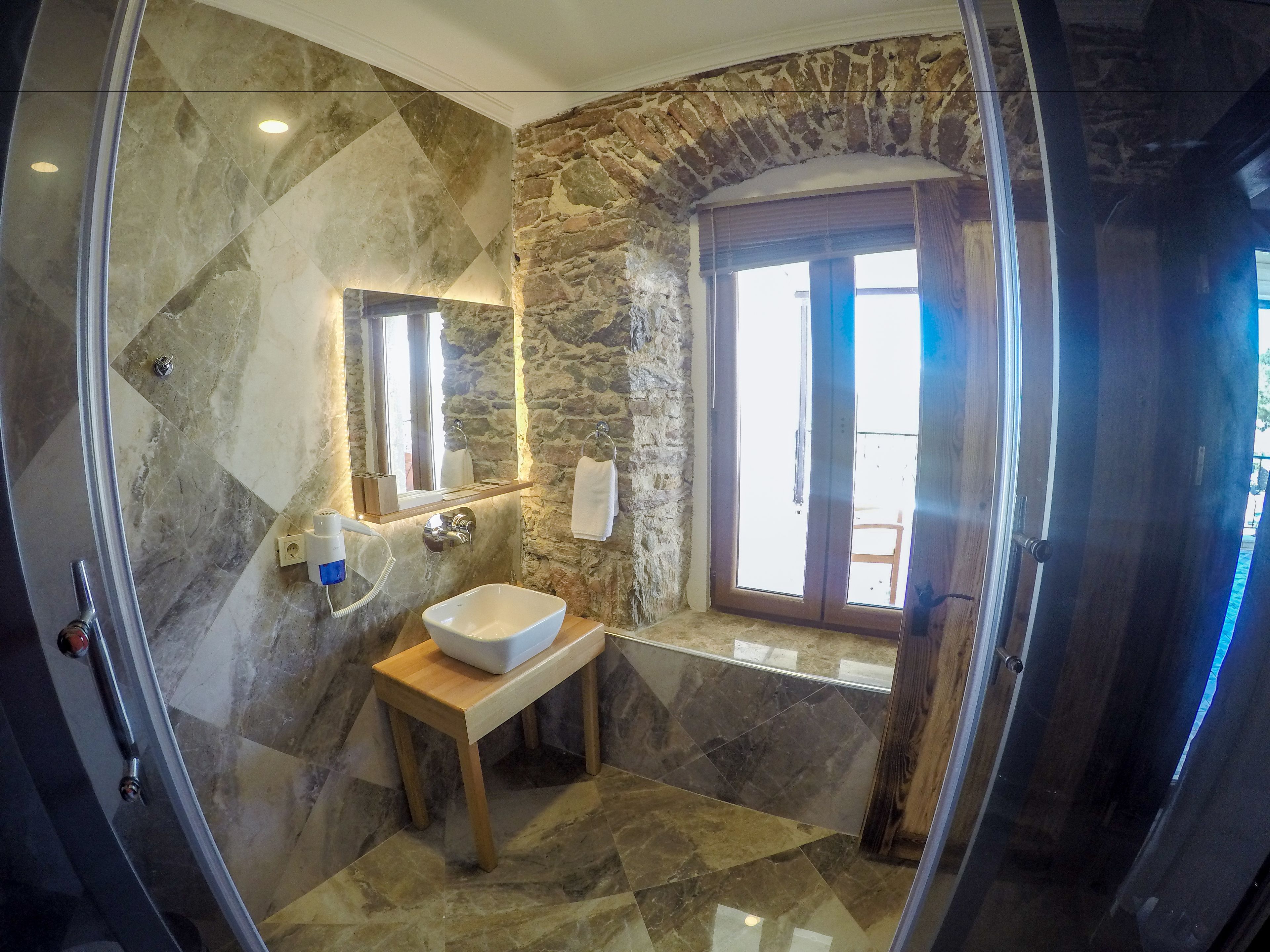 suite, sea view | bathroom | designer toiletries, hair dryer, slippers, towels