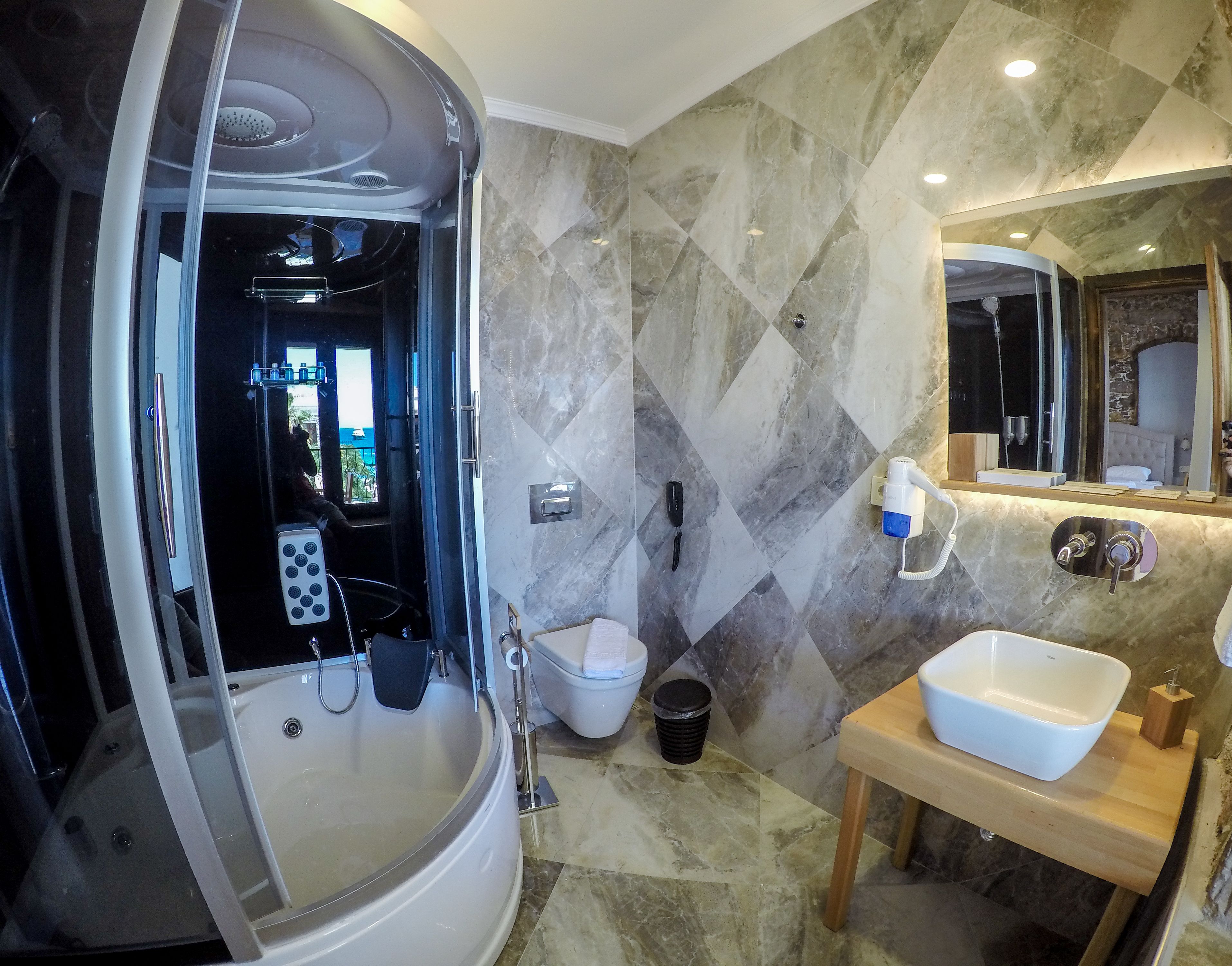 suite, sea view | bathroom | designer toiletries, hair dryer, slippers, towels