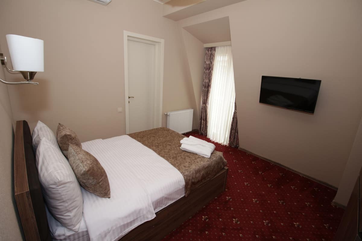 Standaard tweepersoonskamer, uitzicht op stad | 2 slaapkamers, hypoallergeen beddengoed, Select Comfort-bedden