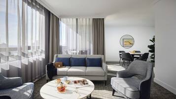 Suite, 2 Bedrooms (Altitude) | Living area | Flat-screen TV