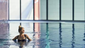 Indoor pool, open 6:00 AM to 10:00 PM, pool loungers