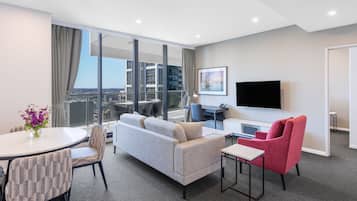 2 Bedroom Suite | Living area | 50-inch flat-screen TV with digital channels, TV, streaming services