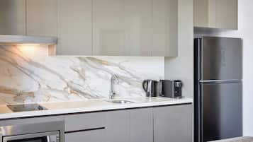 1 Bedroom Balcony Sky Suite | Private kitchenette | Full-sized fridge, microwave, stovetop, dishwasher