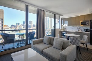 1 Bedroom Balcony Suite | Living area | 50-inch flat-screen TV with digital channels, streaming services