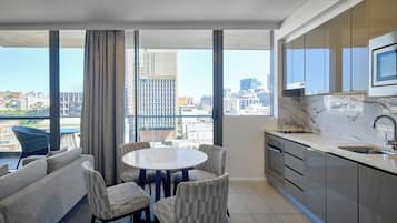 1 Bedroom Balcony Suite | Living area | 50-inch flat-screen TV with digital channels, streaming services