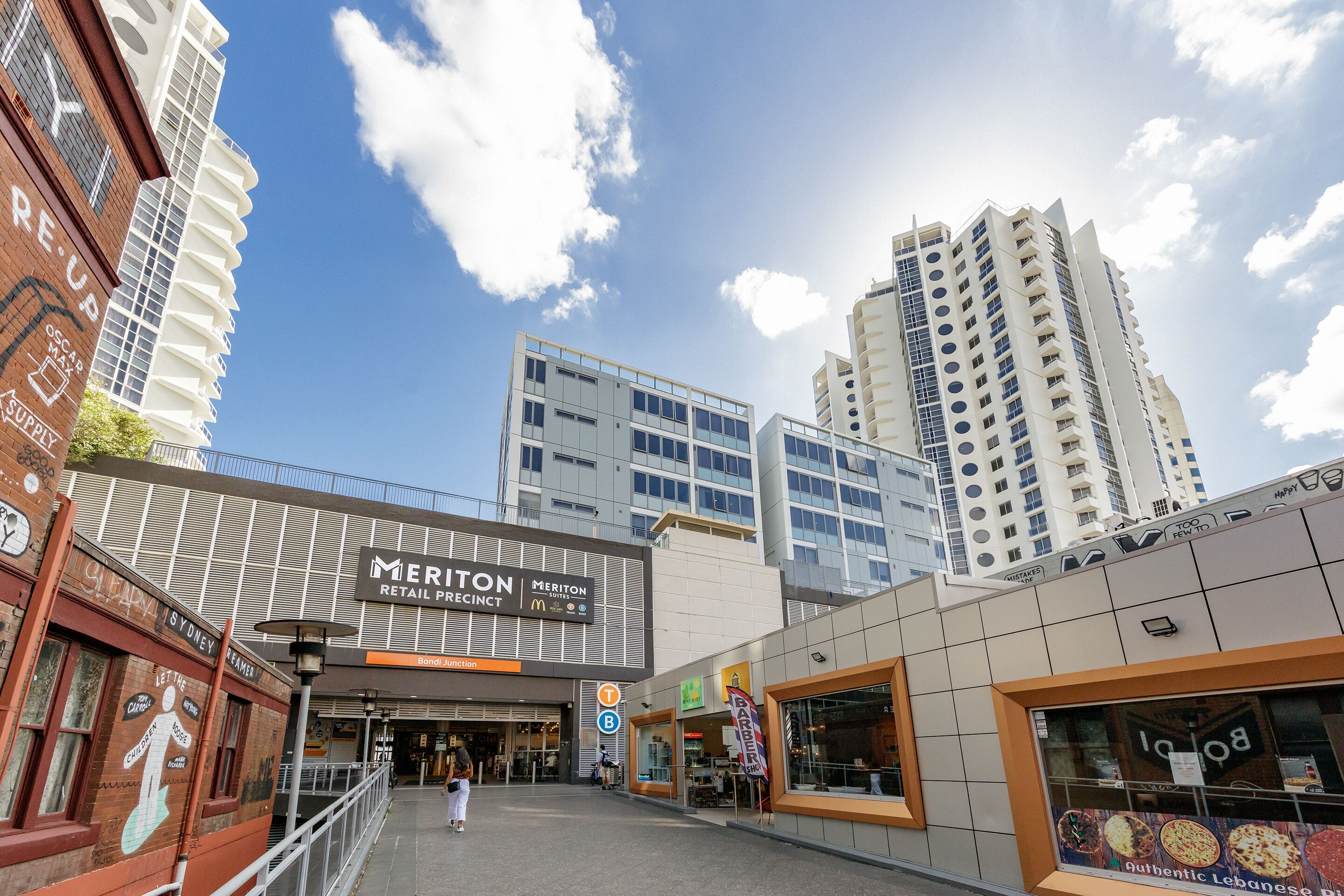 A shopping area with a Meriton Retail Precinct, a McDonald's, and a restaurant named 'Barber'.