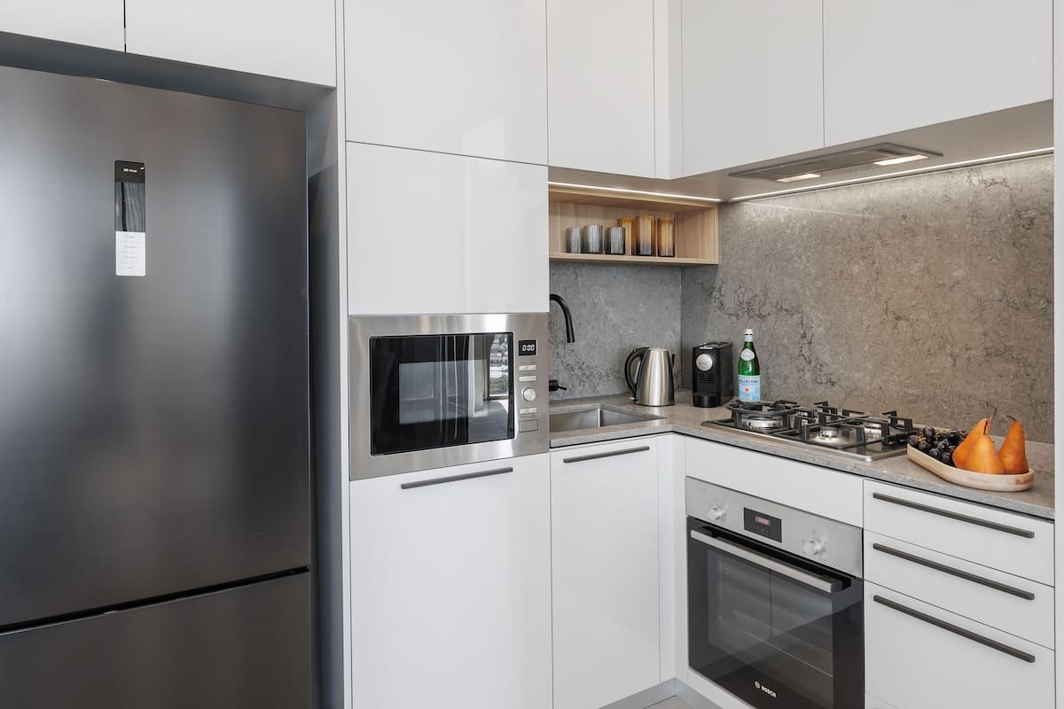2 bedroom luxury suite | private kitchen | fridge, microwave, stovetop, dishwasher