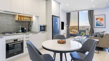 1 Bedroom Suite | Private kitchen | Fridge, microwave, stovetop, dishwasher