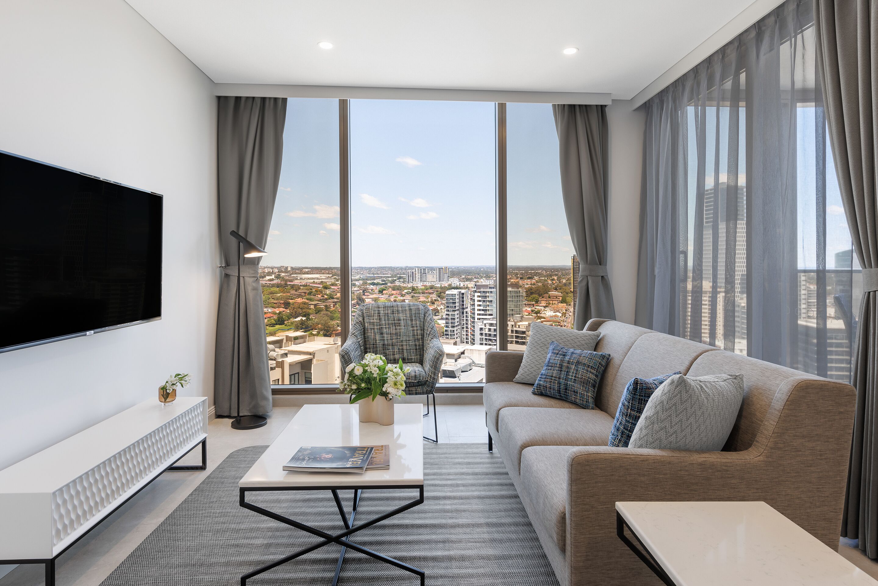 1 bedroom luxury suite | living area | 55-inch smart tv with digital channels, tv, streaming services