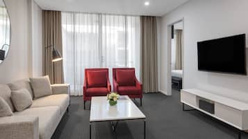 2 Bedroom Suite | Living area | Flat-screen TV