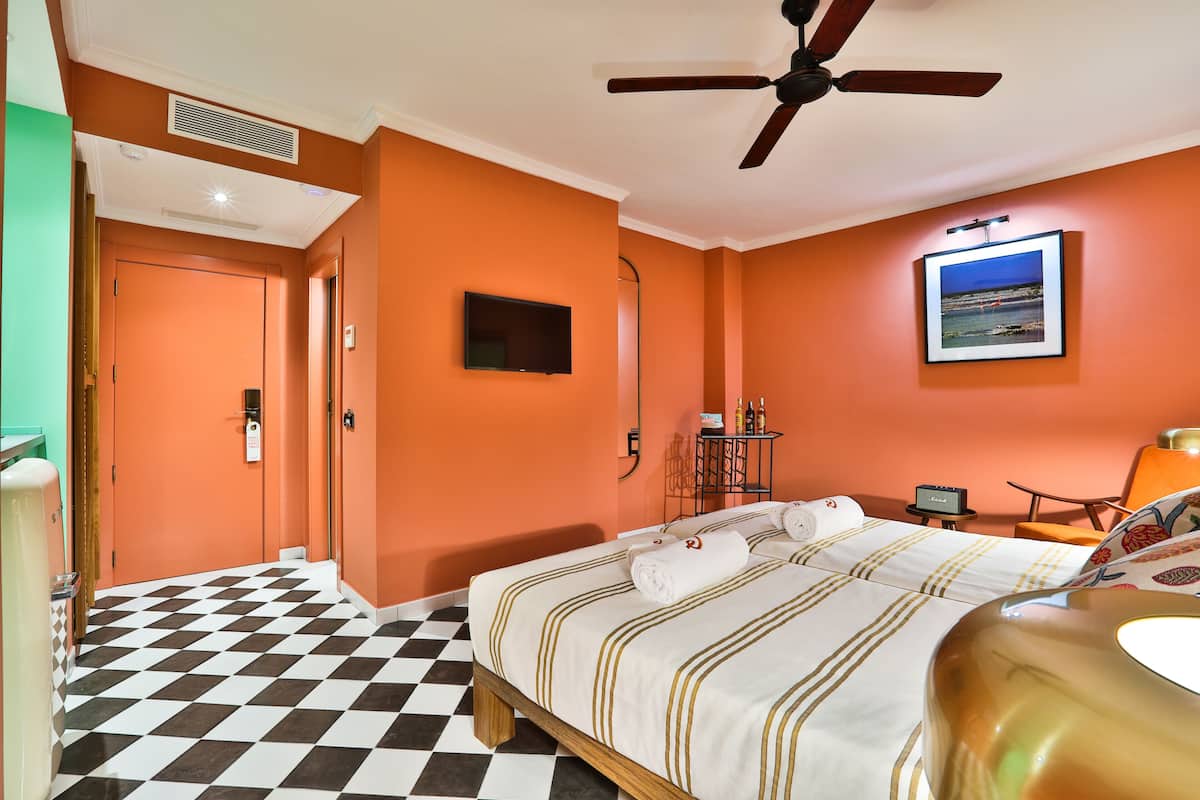 Ropa de cama de alta calidad y minibar