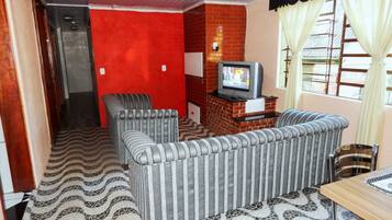 Standard House, 5 Bedrooms | Living room | TV