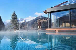 Outdoor pool, open 10:00 AM to 7:30 PM, pool loungers