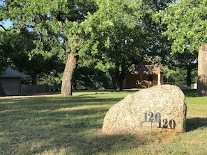 1/3ac in quiet neighborhood hidden away behind mature oaks. Not a zero-lot condo