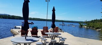 Adorable cottage set among tall pines with sandy beach -only .5  mile from town.