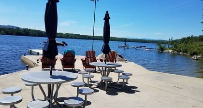Adorable cottage set among tall pines with sandy beach -only .5 mile from town.