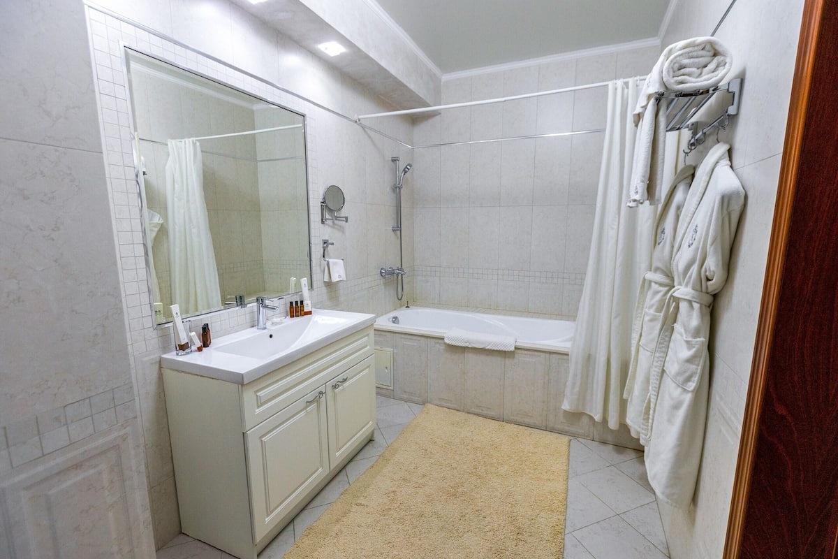luxury suite | bathroom | free toiletries, hair dryer, bathrobes, slippers
